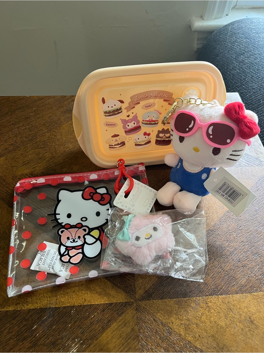 Hello Kitty Bundle - Plush Hello Kitty Bag Charm, Zip Pouch, and Container.